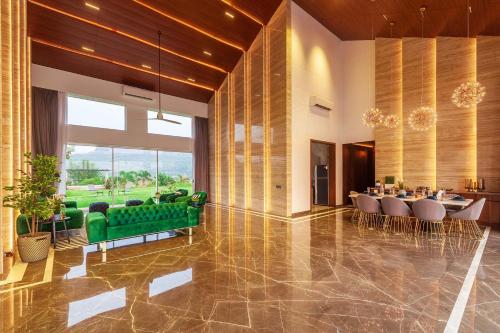StayVista's Villa 107 at Canary Farms - Pure Veg with Huge Lawn, Pool and Home Theatre in Gold Valley