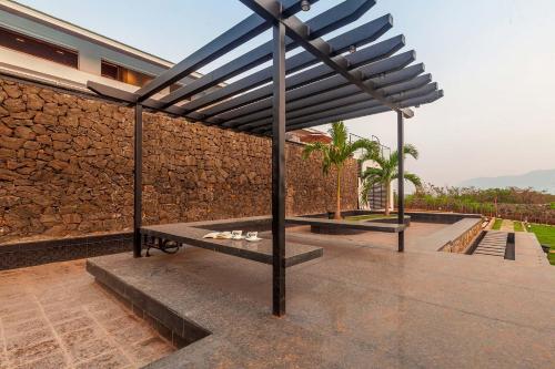 StayVista's Villa 107 at Canary Farms - Pure Veg with Huge Lawn, Pool and Home Theatre in Gold Valley