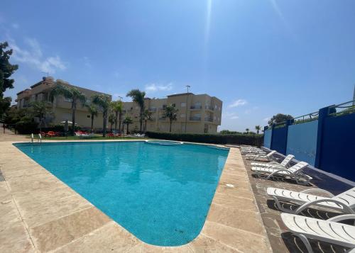 Swimming pool, OASIS BEACH APPARTEMENT MEUBLe RESIDENCE FERMEE AVEC PISCINE TAMARIS 2 SIDI RAHAL in Sidi Rahal