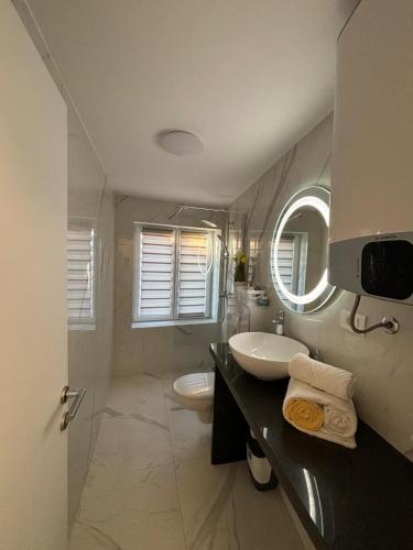 Betina apartments with parking space near the beach in Murter
