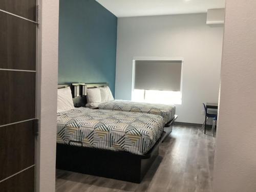 Queen Room with Two Queen Beds - Non-Smoking room in Studio 6 Dallas TX - Fair Park