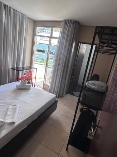 Kitnet no centro de Betim in เบทิง