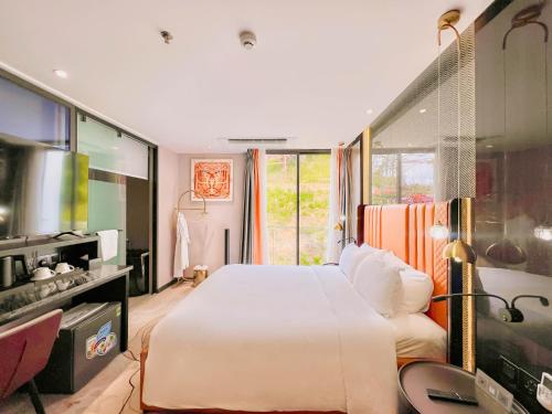 New Century Dalat Hotel - Tap to explore photos