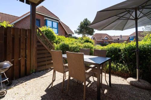 Ferienwohnung Kiter EG mit Terrasse in Lemkenhafen