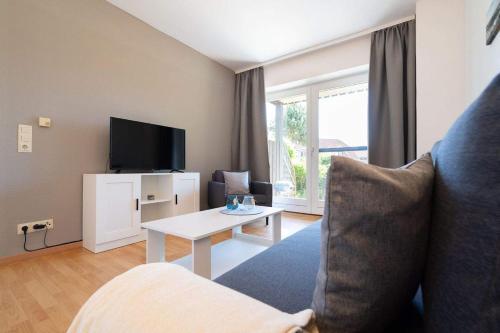 Ferienwohnung Kiter EG mit Terrasse in Lemkenhafen