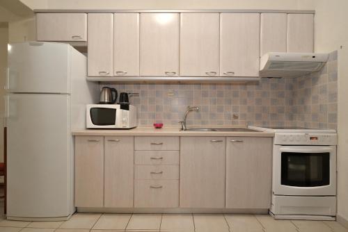 Corner house, Leptokaria (fotografie 4)