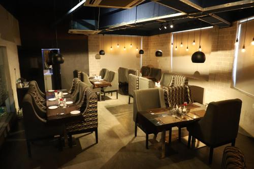 餐廳, The Blue Lagoon Hotel Premium in 克塔克