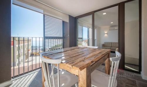 Two-Bedroom Deluxe Apartment with Balcony room in Apartamentos Boutique Murmur