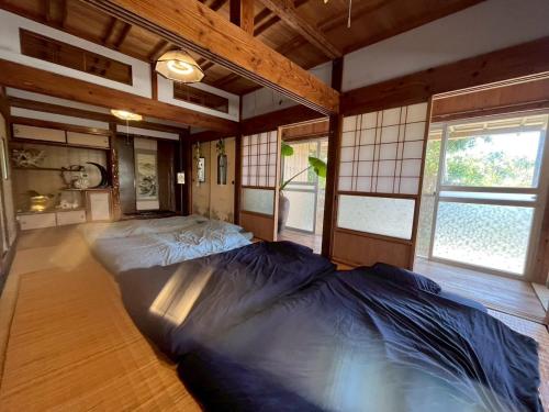 -大人数で泊まれる一棟貸し-なかまあじーんやー海近くの素敵な島暮らし体験-手久津久- (-大人数で泊まれる一棟貸し-なかまあじーんやー海近くの素敵な島暮らし体験-手久津久-) in Kikai