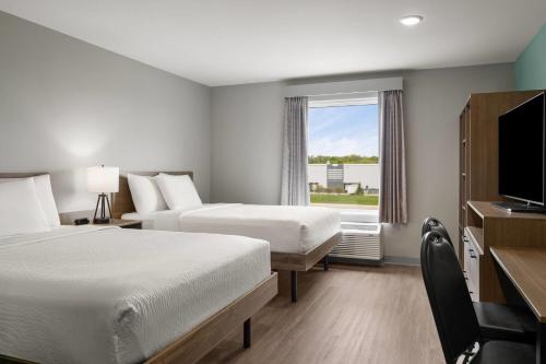 에코 스위트 익스텐디드 스테이 바이 윈덤 인디애나폴리스 아메리플렉스 - 화장실