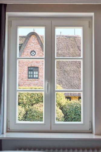 View, Reethus Keitum mit Kamin und Sudgarten in direkter Wattnahe in Klentertal