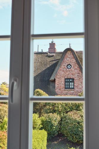 View, Reethus Keitum mit Kamin und Sudgarten in direkter Wattnahe in Klentertal