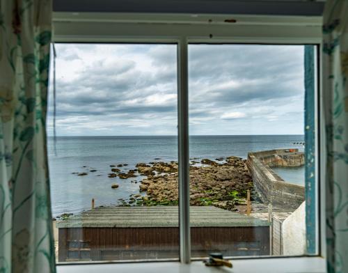 Skats, Fisherman's Cottage in Pennan in Pennan