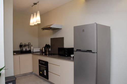 Ellara Escapes - Modern 1-Bedroom Apartment with Hill View - Sodnac, Quatre Bornes in Vacoas-Phoenix
