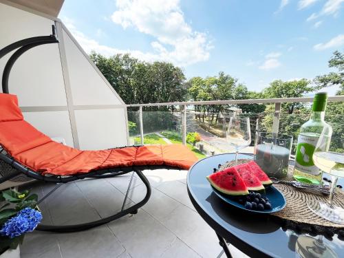 ระเบียง/ชานเรือน, Cosy apartment with lake views in ฟอนยอด