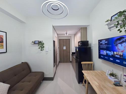 1BR Condotel with Balcony at FAME Residences #FM30-1, Manila
