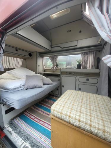 Sleep inside a classic Volkswagen Westfalia or our legendary Mercedes Düdo overland cabin in central Svolvær Close to public showers and toilets NO PARKING