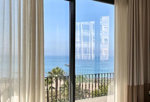 陽台/露台, Comfy Studios Hotel in 貝納爾馬德納鎮中心