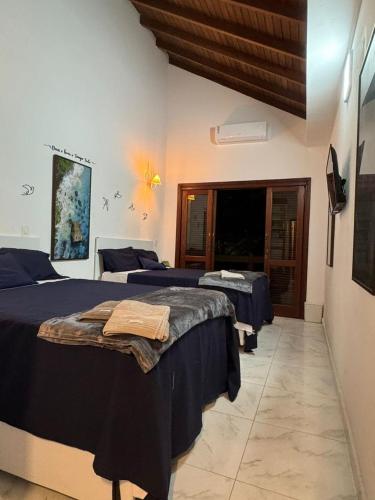 suite ao som do mar - tombo guaruja near Churrascaria Yedo