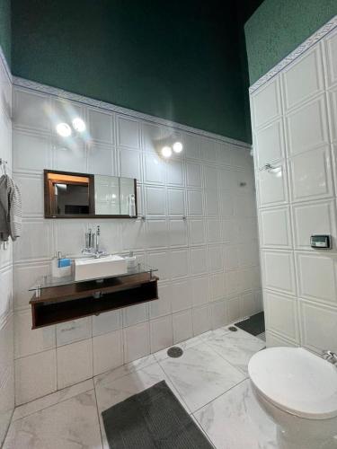 suite ao som do mar - tombo guaruja near Churrascaria Yedo