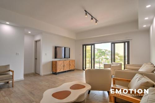 Brand New 2-bedroom apartment with sea view in Point Blanche in ポイント ブランチ