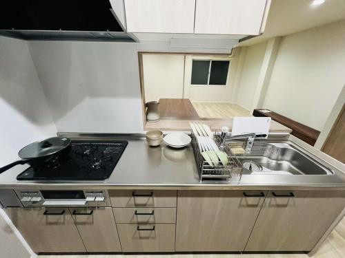 Kajima 2 minutes from the station, 5 minutes by train to Namba and Shinsaibashi area