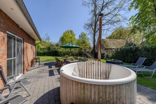 花园, Ferienhaus Hünzingen № 2 (Ferienhaus Hunzingen № 2) in 瓦尔蒐德