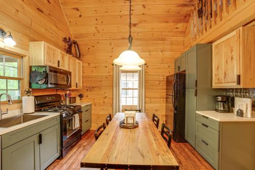Warm and Woodsy Rothbury Escape with Loft and Porch in Rothbury, USA