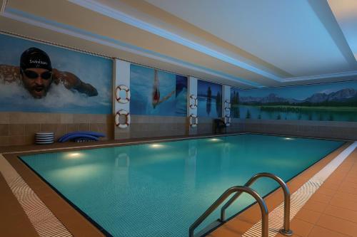 مسبح, فندق ريف هوم (Reef Home Hotel) in الربوة