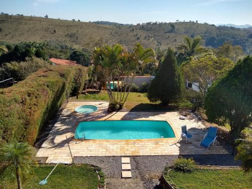 Chácara do Nari - Casa com Piscina em Condomínio Fechado (Chacara do Nari - Casa com Piscina em Condominio Fechado) in Bom Jesus Dos Perdões