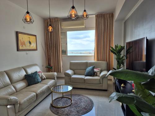 Skupni salon/TV območje, Lovely three-room apartment above the promenade in Ashdod