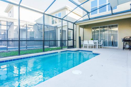Modern Home with Private Pool and Game Room at Storey Lake SL2742 thumb 2