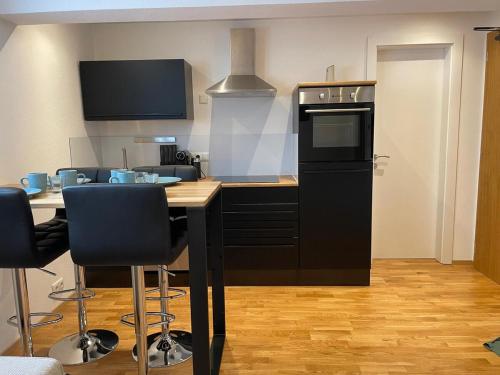 廚房, 1,5-Zimmer, Top ausgestattet, 4 Pers, Souterrain, Self Check-in, Parkplatz, Netflix & Amazon Prime in 弗林特斯巴赫阿姆因