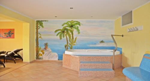 Banheira de hidromassagem, Hotel Fantur in Aich