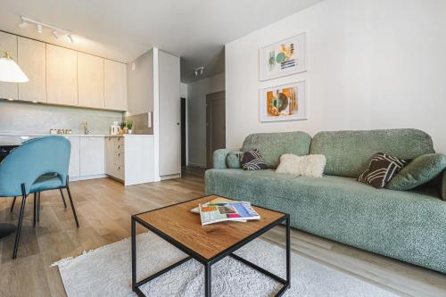 Komfortowy apartament z balkonem i parkingiem