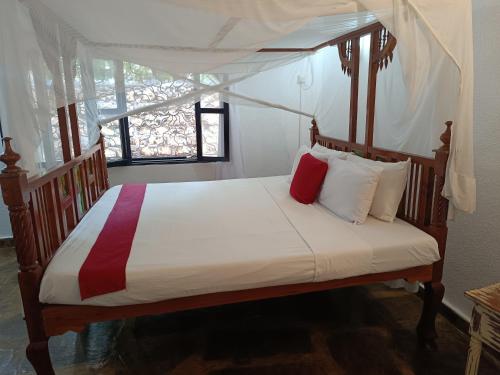 Tembo village Jacaranda road in วาตามู