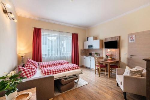 포그타로이트 Komfort Apartment Römersberger - 4 (Komfort Apartment Romersberger - 4) 4성급 싱글룸 스위트룸