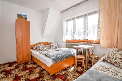 Pokoje Goscinne U Landy – Poronin, IA