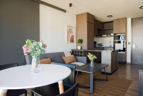 Chic 2BR Haven in the Heart of Las Condes Oasis
