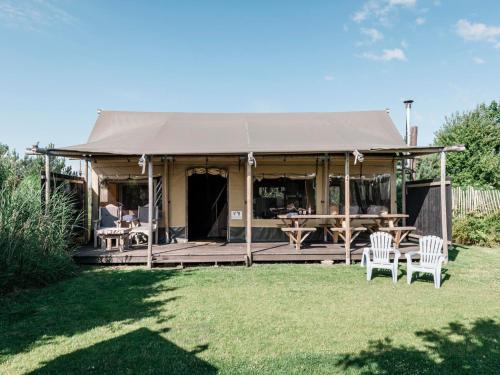 Unterkunft von außen, Charming Woodlodge Stay in Callantsoog