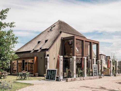 Unterkunft von außen, Charming Woodlodge Stay in Callantsoog