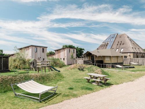 Unterkunft von außen, Charming Woodlodge Stay in Callantsoog