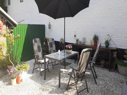 Garden, Modernized holiday home with terrace in Sittard
