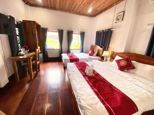 Deluxe Triple Room image 2