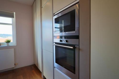Luxury Prague Penthouse with Heated Floors, Castle Views & Rooftop Terrace, Prague (photo 11)