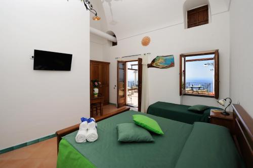 Quadruple Room with Balcony and Sea View