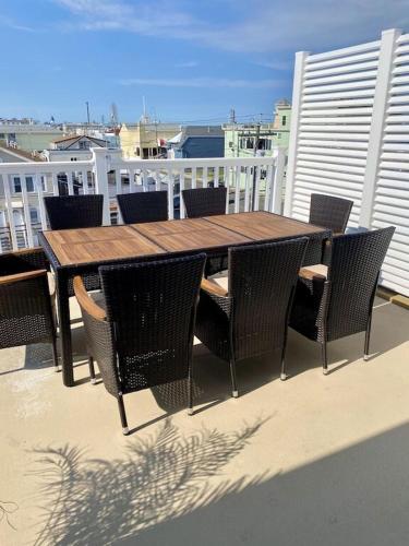Luxury Beachfront penthouse with rooftop ocean views off private balcony