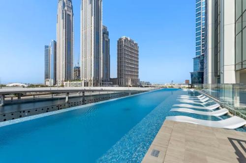 Stylish 2BR - Burj Khalifa - Waterfront View - Fully Furnished - image 7