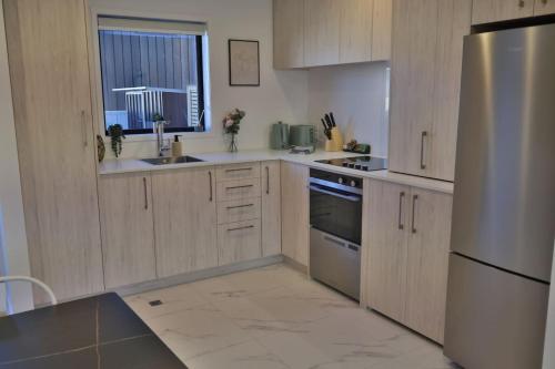 Cosy 2BR House in Awaroa Road, Auckland (fotografie 8)