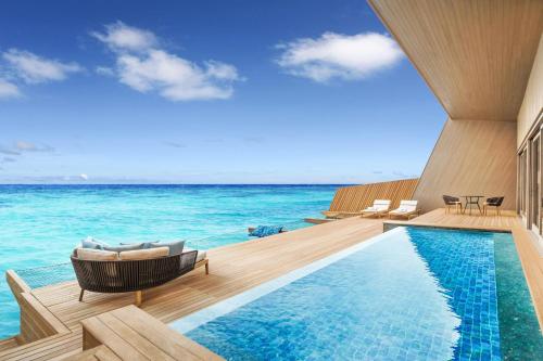 Swimming pool, The St. Regis Maldives Vommuli Resort in Dhaalu Atoll